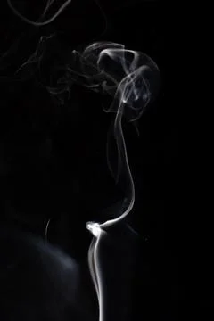 Cloud of white smoke on black background Stock Photos