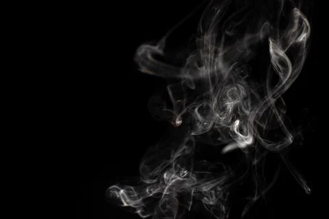 Cloud of white smoke on black background Stock Photos