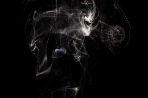 Cloud of white smoke on black background Stock Photos