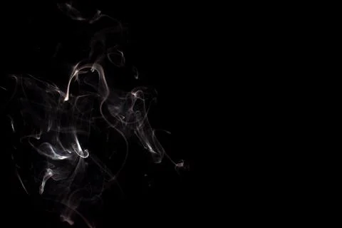 Cloud of white smoke on black background Stock Photos