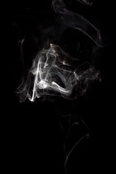 Cloud of white smoke on black background Stock Photos