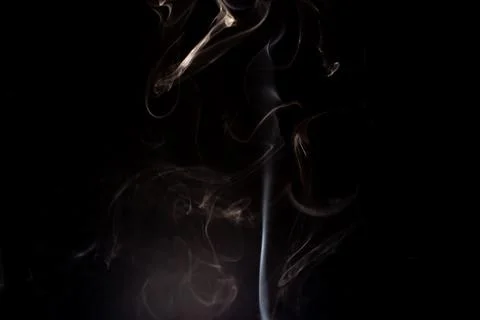 Cloud of white smoke on black background Stock Photos