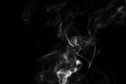 Cloud of white smoke on black background Stock Photos
