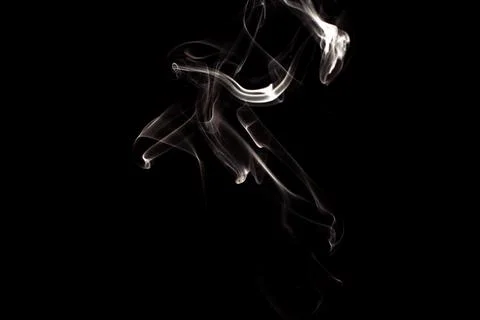 Cloud of white smoke on black background Stock Photos