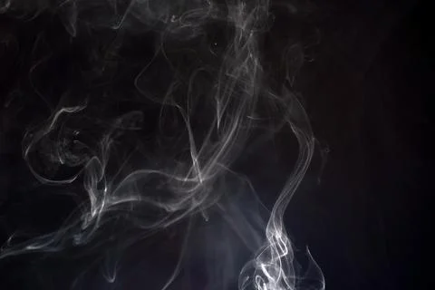 Cloud of white smoke on black background Stock Photos