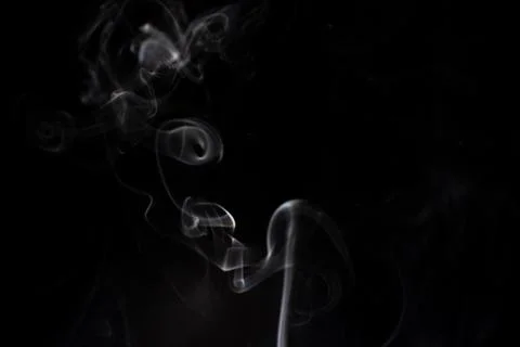 Cloud of white smoke on black background Stock Photos