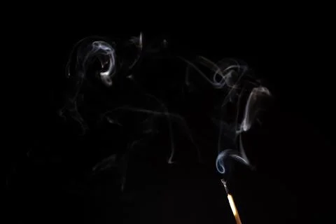 Cloud of white smoke on black background Stock Photos