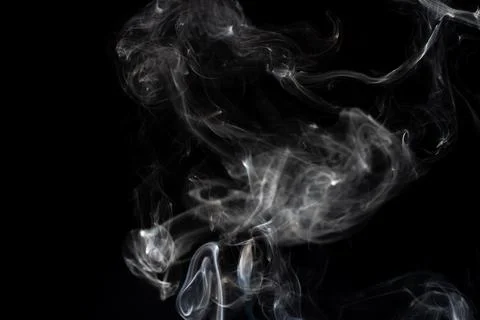 Cloud of white smoke on black background Stock Photos