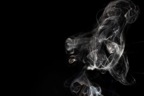 Cloud of white smoke on black background Stock Photos