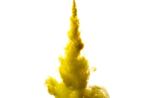 A cloud of yellow paint released into clear water. Isolate on a white backgro Stock Photos