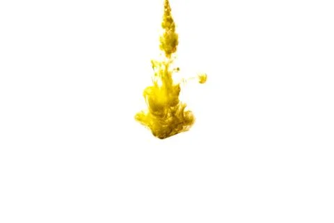 A cloud of yellow paint released into clear water. Isolate on a white backgro Stock Photos