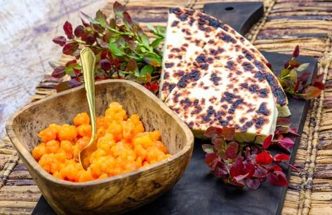Cloudberries with bread cheese Stock Photos