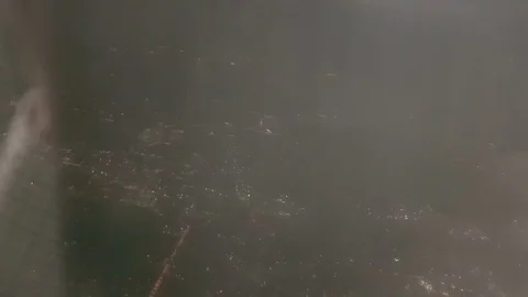 The clouded sky and sun set during a flight Видео 99378678