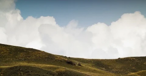Cloudly sky above the hills Stock Footage