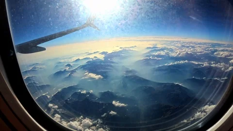 Cloud/Mountain view from airplane window [4K60p] Stock-Footage 127133238
