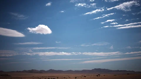 CLOUDPLAY IN CLEAR BLUE SKY, LOW HORIZON HD Stock Footage 45342194