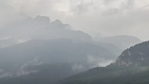Clouds above Dolomites mountain Video stock 295287697