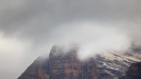 Clouds above Dolomites mountain Stock Footage 295289616