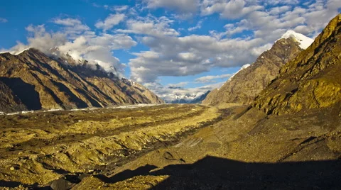 Clouds above evening glatcher and mountains Stock Footage 54441453