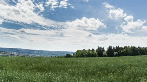 Clouds above Field Tilt Timelapse 스톡 동영상 24885315