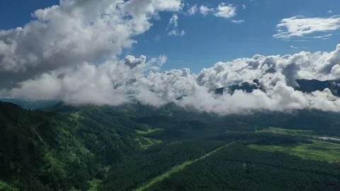 Clouds above green valley Stock Footage 112927508