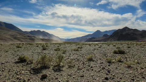 Clouds above the Khovd river, Mongolian Altai, Ulgii, Mongolia. Full HD Stock Footage 95413331