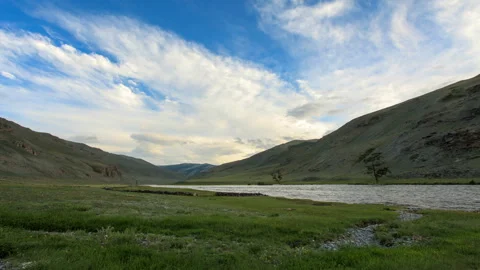 Clouds above the Khovd river, Mongolian Altai, Mongolia. Full HD Video stock 96163876
