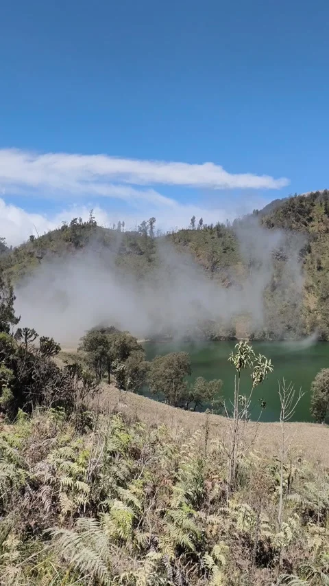 Clouds above the lake and mountain. Stock Footage 340003799