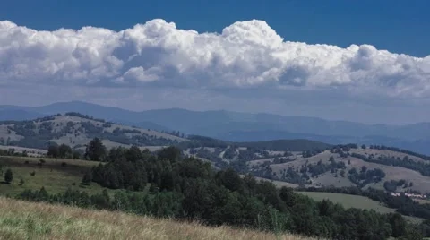 Clouds above mountain landscape timelapse Stock Footage 43233548