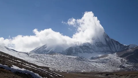 Clouds above mountain peak Video stock 74181765