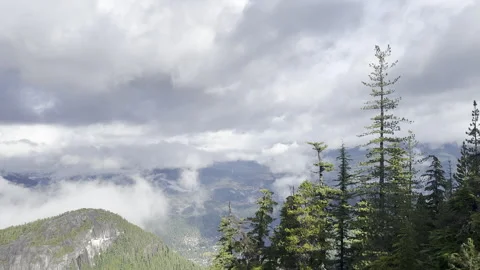 Clouds above mountains Stock Footage 256936342