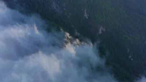 Clouds above the mountains, top view Stock Footage 151150565