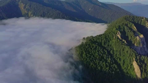 Clouds above the mountains, view from a drone Stock Footage 151148761