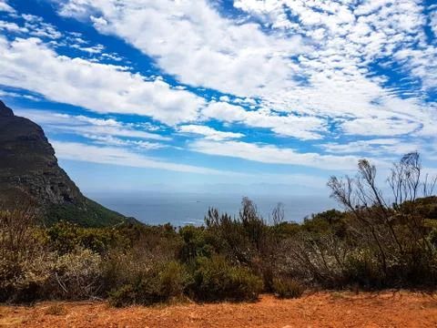 Clouds above the ocean Stock Photos