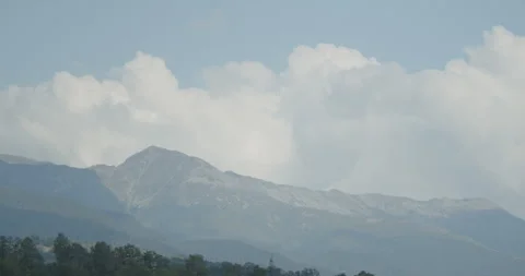 Clouds above Parangul mare peak in Romania 4K video Stock-Footage 254302860