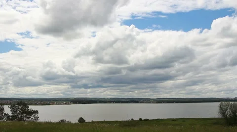 Clouds above the river. Natural landscape Video stock 66311501
