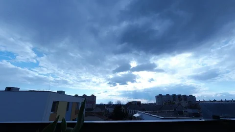 Clouds above roofs - time lapse Stock Footage 127713379