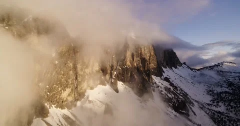 Clouds above Sella Mountain in the Dolomites, Aerial view of Alpine Landscape Stock Footage 132109205