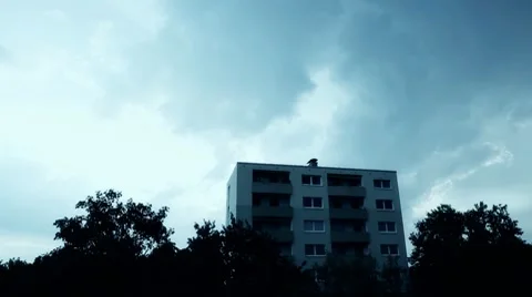 Clouds above a skyscaper time lapse Stock Footage