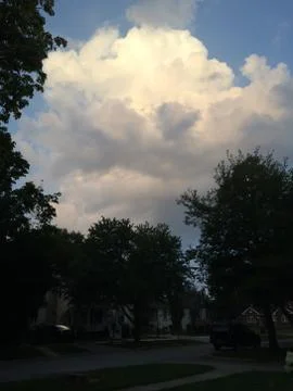 Clouds above the street Stock Photos