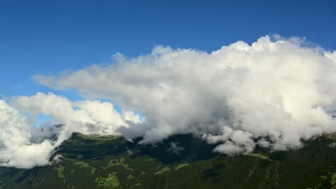 Clouds above Swiss mountains Stock Footage 289906329
