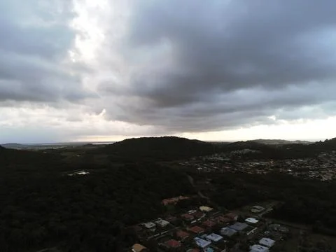 Clouds above the town Stock Photos