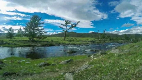Clouds above the Ulaan river, Mongolia. Full HD Stock Footage 69132057
