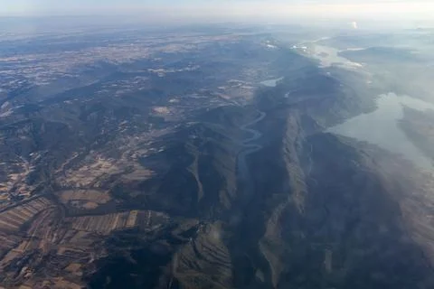 Clouds from above, view from an airplane. Horizon and sunset from space. Foto stock