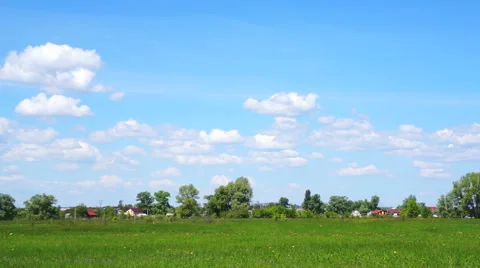 Clouds above the village. Timelapse Stock Footage 50877569