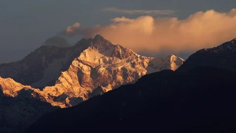 Clouds accumulates around Mt. Kangchenjunga in Sikkim Himalaya Stock Footage 82862265