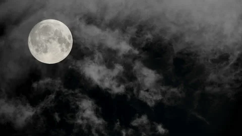 Clouds across a full moon moving at 10x speed - a composite shot. 4K tripod Stock Footage 209978399