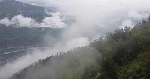 Into the clouds aerial mountain drone shot Stock Footage