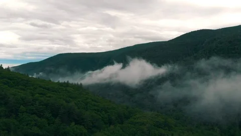 Clouds aerial in mountains Stock Footage 99640825