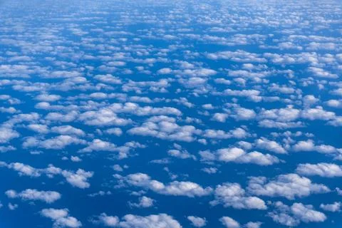 Clouds from an Aerial View sky perspective from above looking down on the c.. Stock Photos